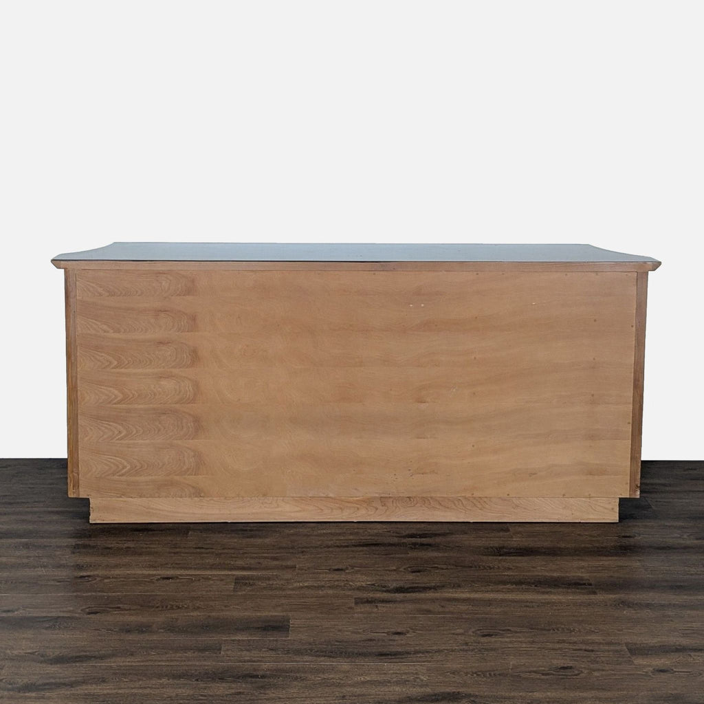 3. Rear view of the Derepage Design sideboard, displaying a plain, light wood back panel.