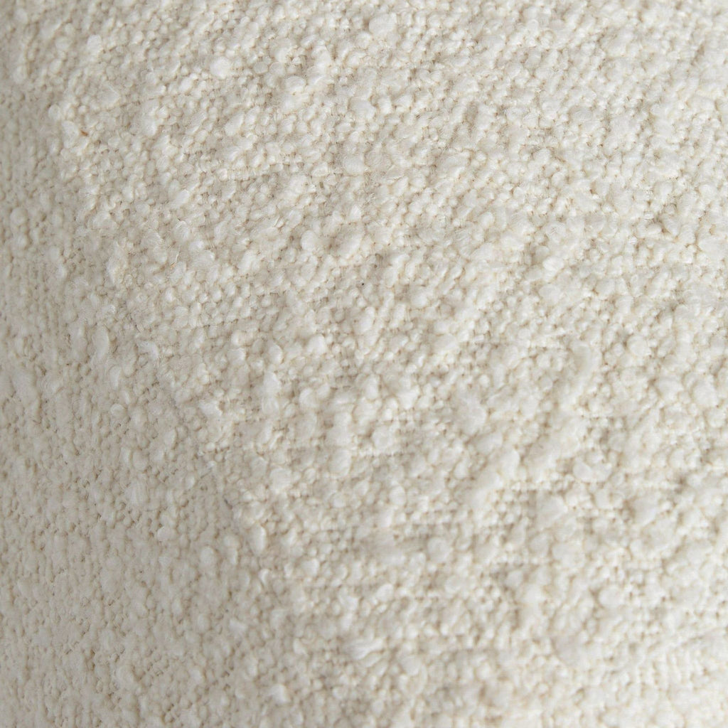3. Detailed view of the cream boucle fabric from the Lulu and Georgia 3-seat sofa, emphasizing its soft texture.