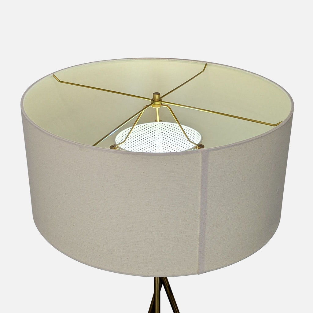 1. Overhead view of a West Elm drum lampshade with a brass frame, part of their Lighting collection.