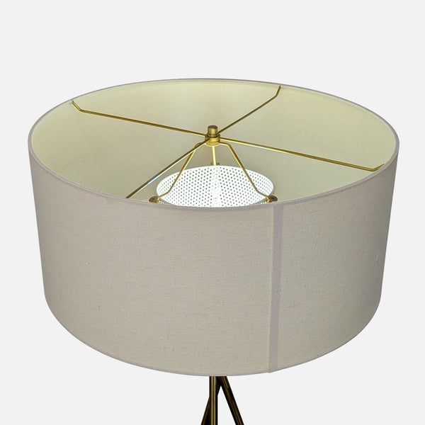 1. Overhead view of a West Elm drum lampshade with a brass frame, part of their Lighting collection.