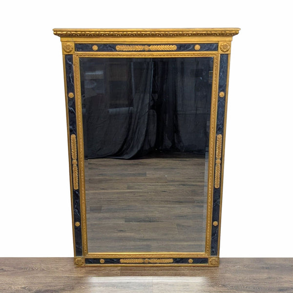 1. Rectangular Neo Classical black and gold Carvers' Guild wall mirror with beveled glass and marbleized finish.  