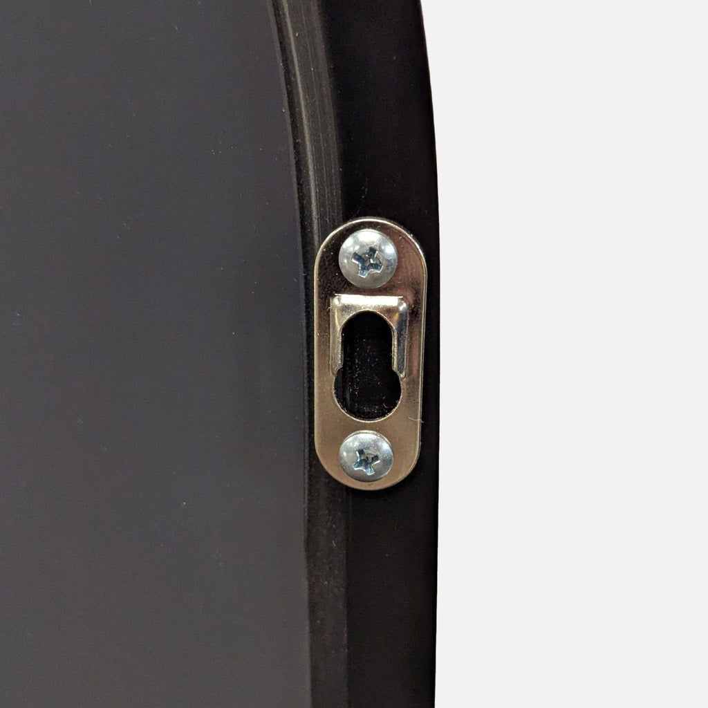 3. Close-up of the Reperch mirror’s metal hanging hardware securely attached to the back of the frame.