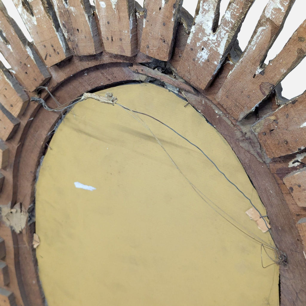 3. Rear view of the Reperch oval giltwood mirror highlighting the wooden construction and hanging wire attachment.