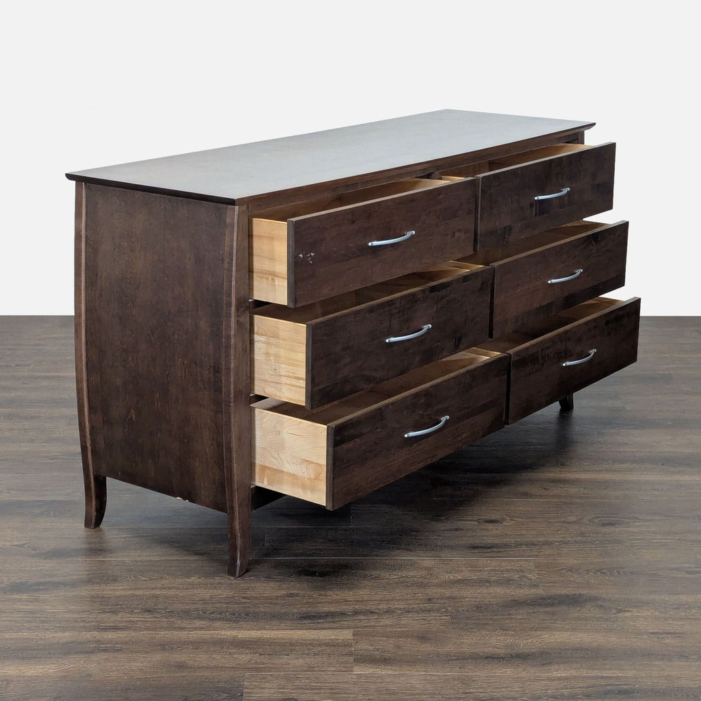 2. Angled side view of Baronet dresser showing six spacious drawers partially open for storage.