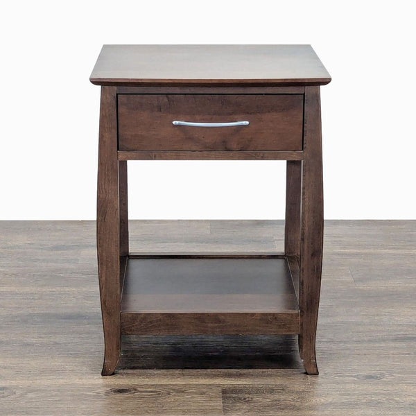 1. Baronet end table with a drawer and lower shelf, shown in dark wood finish against a wood floor.