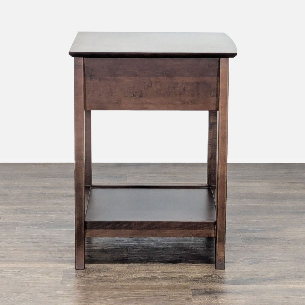 2. Baronet end table with a dark wood finish, single drawer, and a lower shelf, viewed from the front.