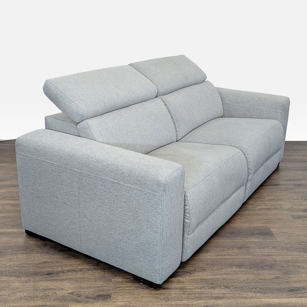 Macy’s Nevio Modern Light Gray Power Reclining Sofa with Adjustable Headrests