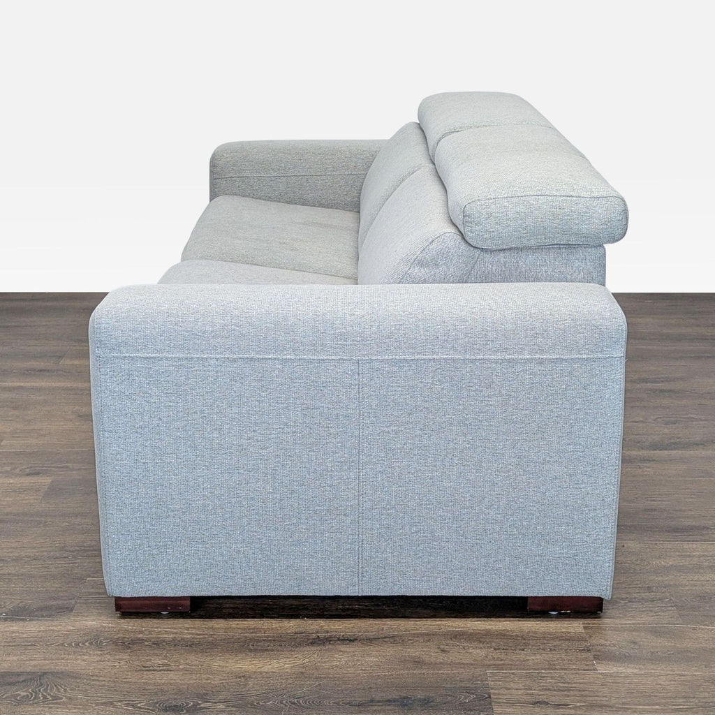 Macy’s Nevio Modern Light Gray Power Reclining Sofa with Adjustable Headrests