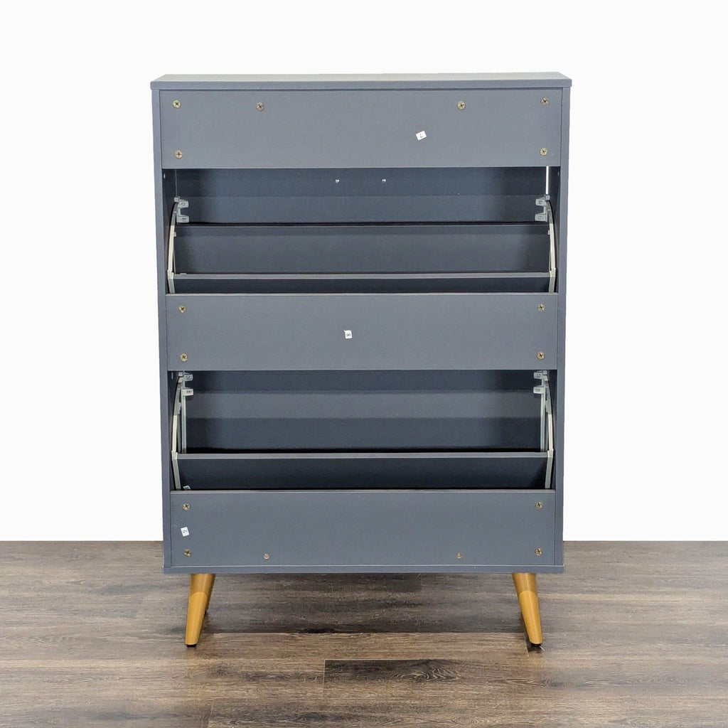 3. Rear view of Everly Quinn gray cabinet with dual tilt-out compartments open, showing interior structure and gold legs.