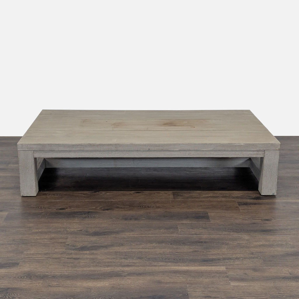 1. Rectangular, light wood Reperch coffee table with wide legs and minimalist design, shown on a dark floor.