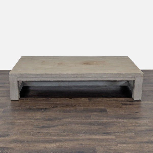 1. Rectangular, light wood Reperch coffee table with wide legs and minimalist design, shown on a dark floor.