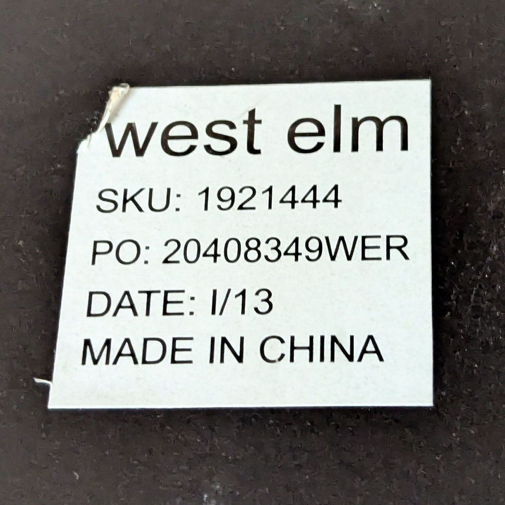 Label showing West Elm branding, SKU 1921444, PO 20408349WER, date I/13, and made in China.