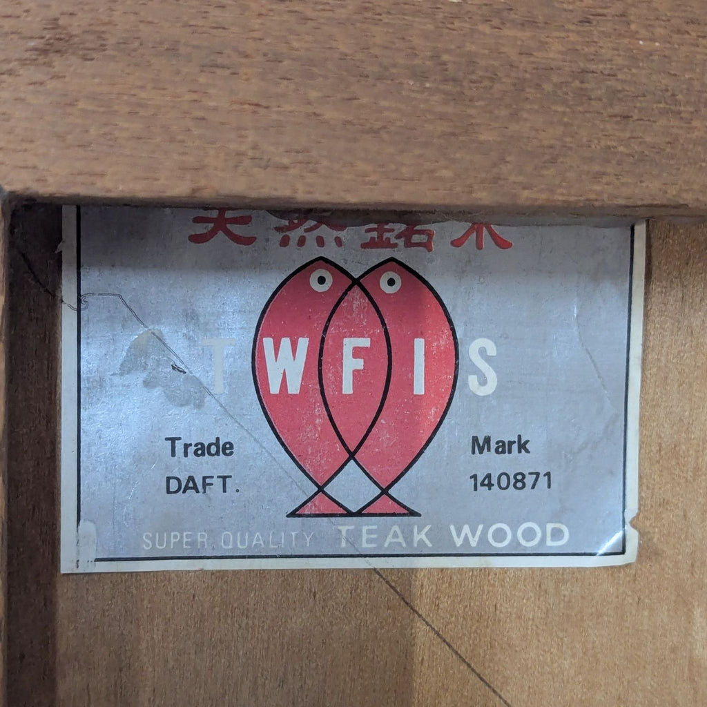 3. Brand label under the Reperch coffee table showing "WFIS" trade mark and stating "Super Quality Teak Wood."