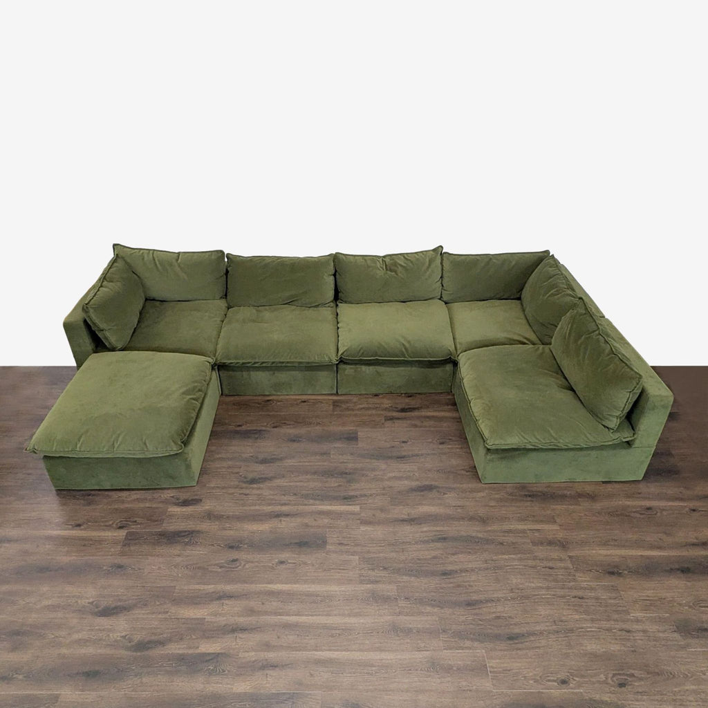 1. Olive green velvet Albany Park sectional with chaise, L-shape design, deep cushions, and plush pillows on wood floor.