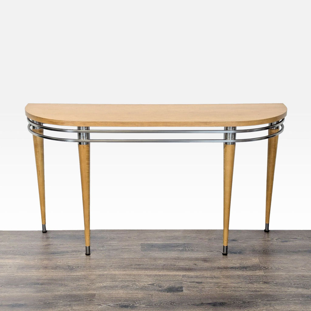 1. Ethan Allen console table with a curved wood top, metal trim, and tapered legs, front view.