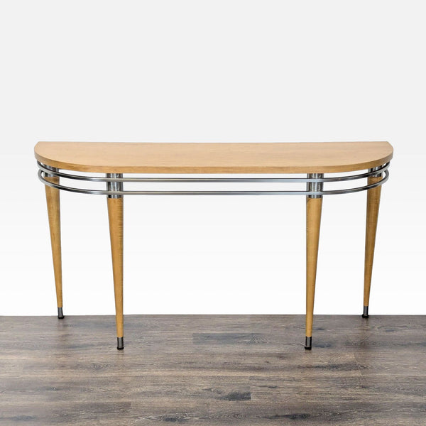 1. Ethan Allen console table with a curved wood top, metal trim, and tapered legs, front view.
