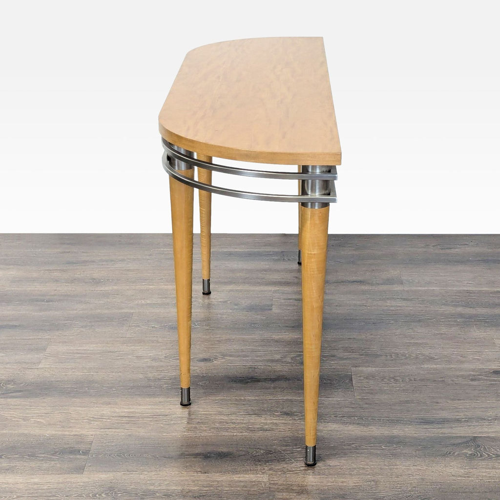 2. Side angle of an Ethan Allen half-moon console table with metal accents and light wood finish.