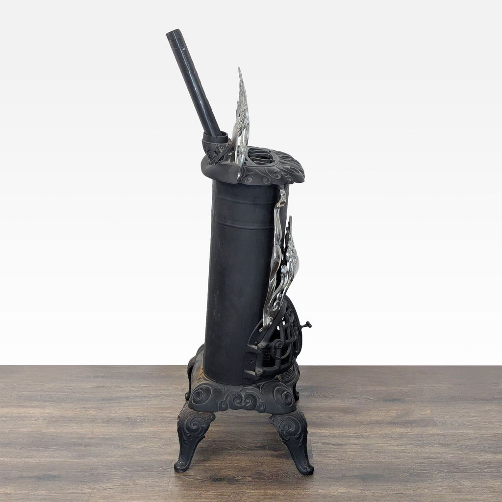 Vintage Iron Parlor Stove with Ornate Details
