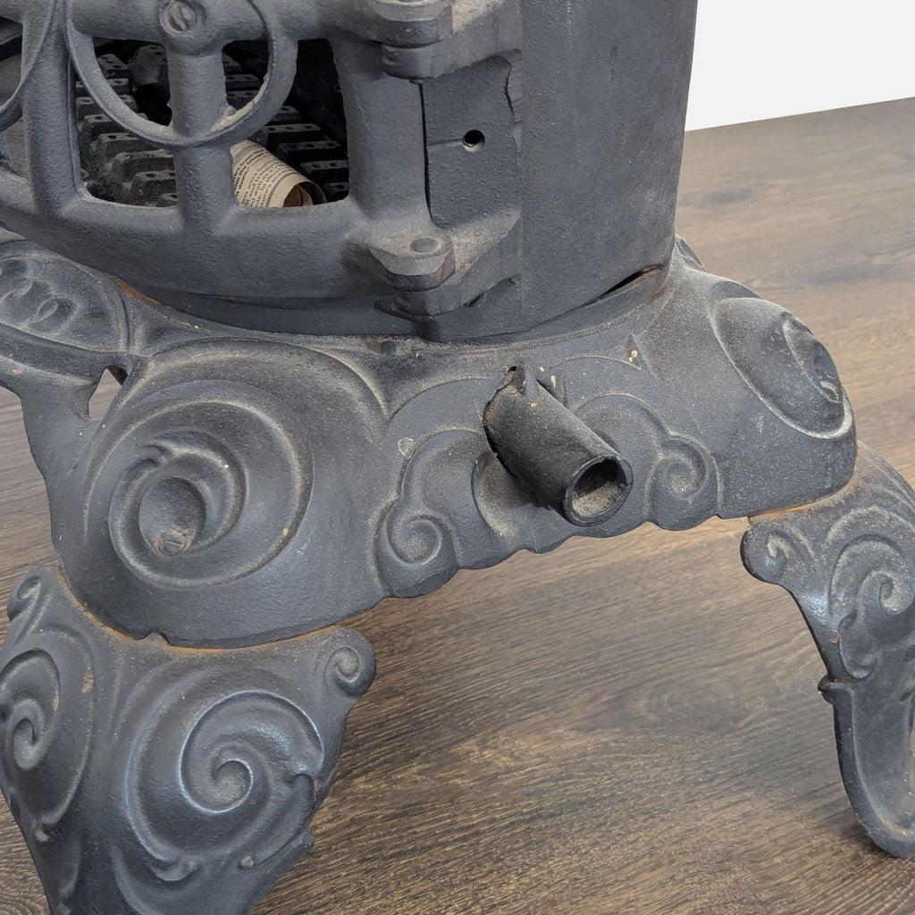 Vintage Iron Parlor Stove with Ornate Details