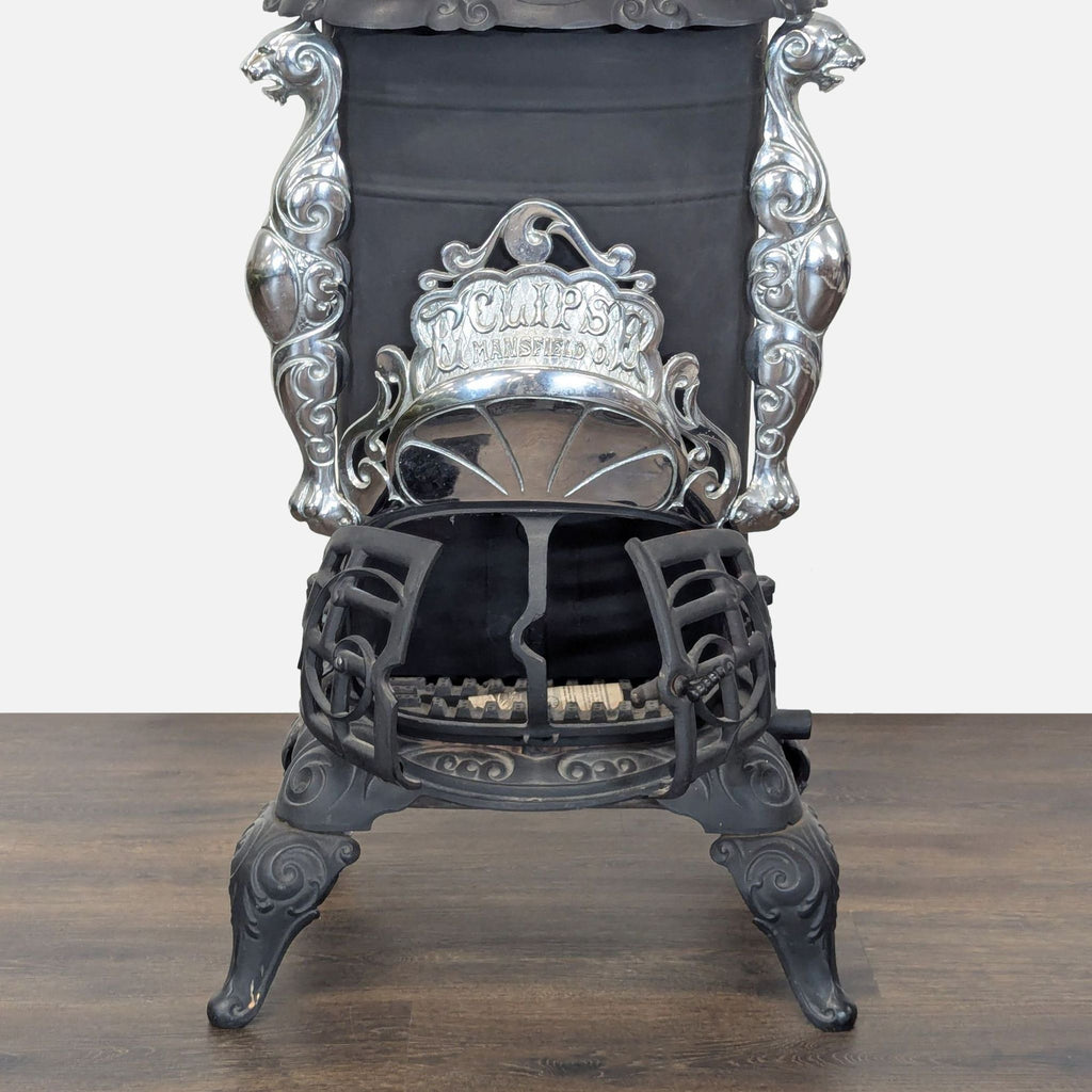 Vintage Iron Parlor Stove with Ornate Details