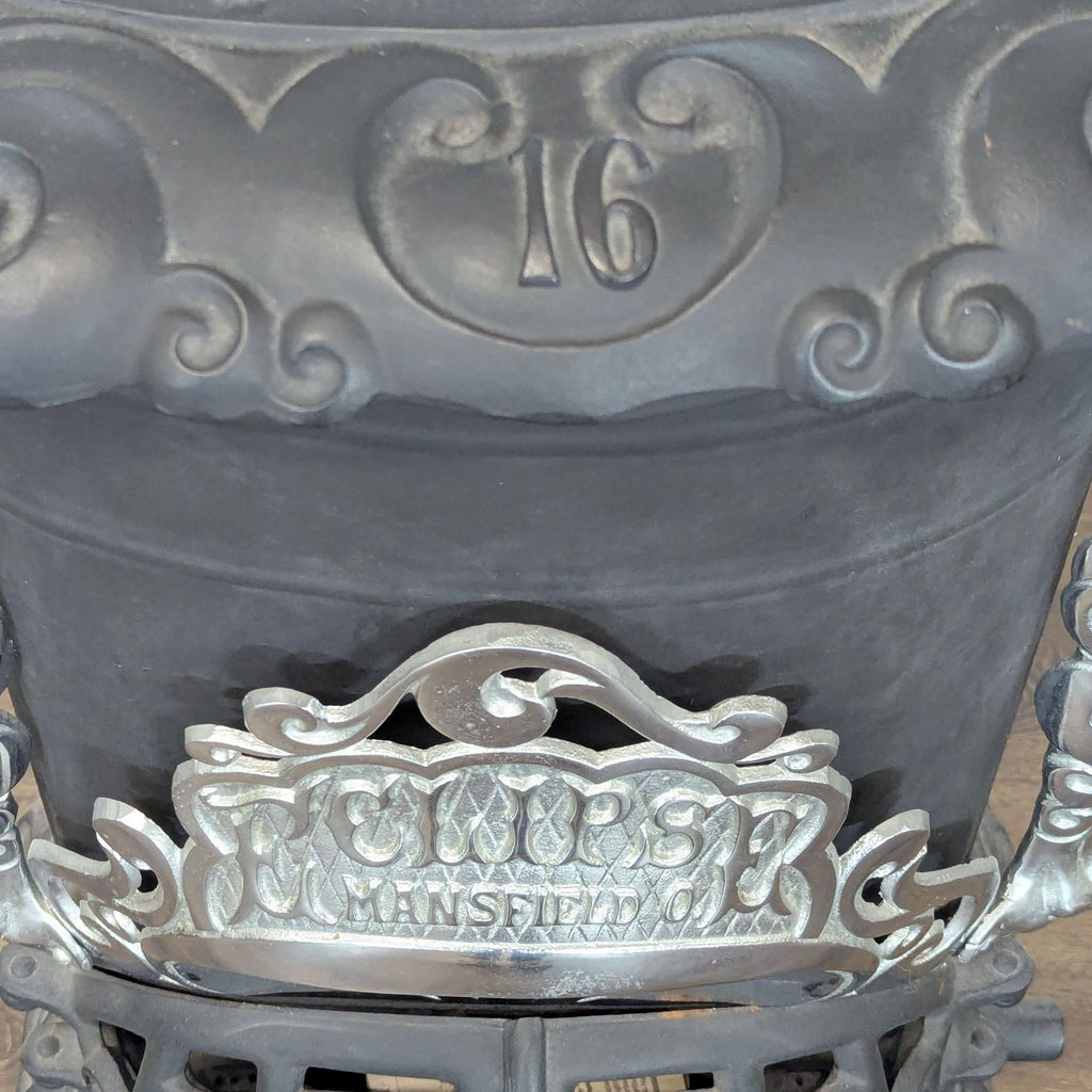 Vintage Iron Parlor Stove with Ornate Details