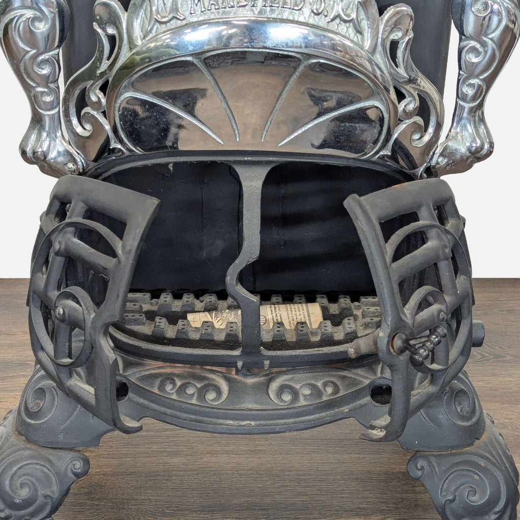 Vintage Iron Parlor Stove with Ornate Details