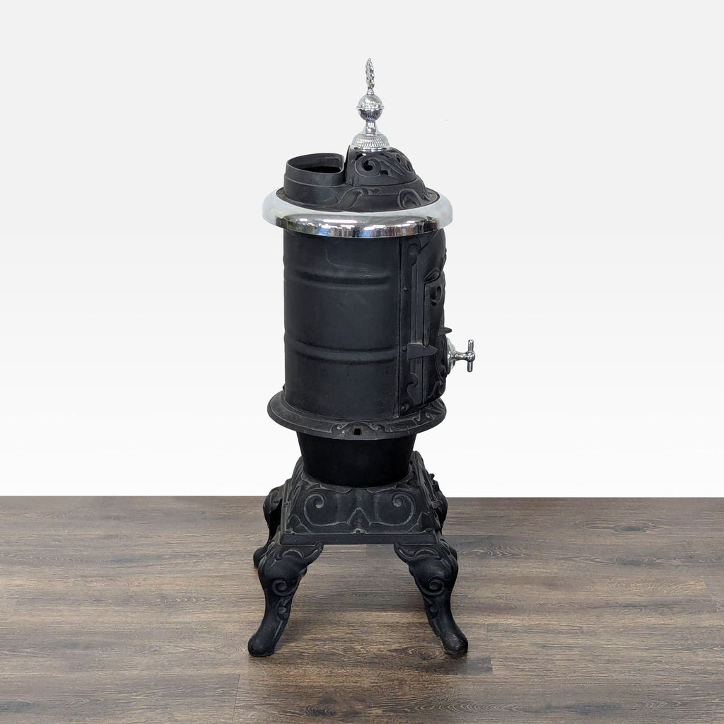 Antique Iron Parlor Stove with Decorative Silver Accents