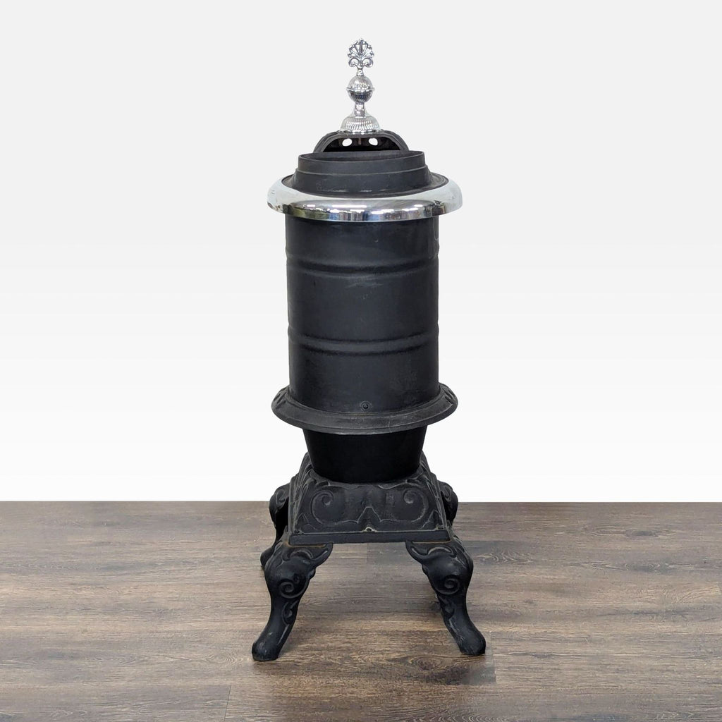 Antique Iron Parlor Stove with Decorative Silver Accents