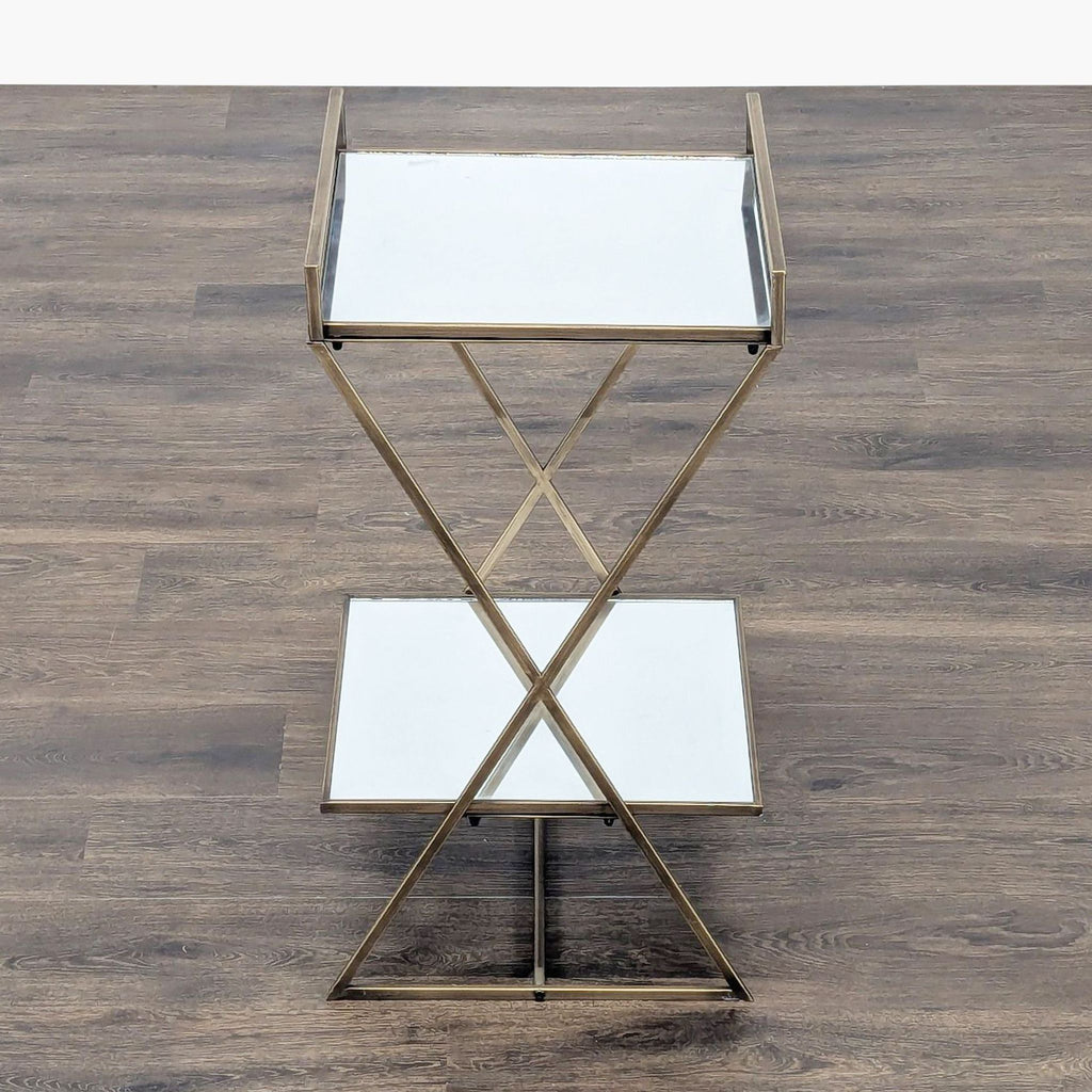 2. Top-down view of a Reperch table, showing mirrored shelves and gold crossed metal frame, category Other.