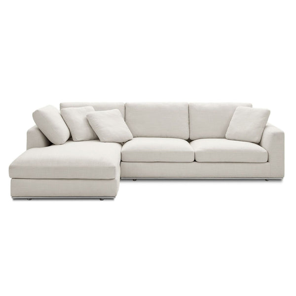 1. Castlery sectional sofa in light beige fabric with chaise lounge and matching cushions, modern and spacious seating.  