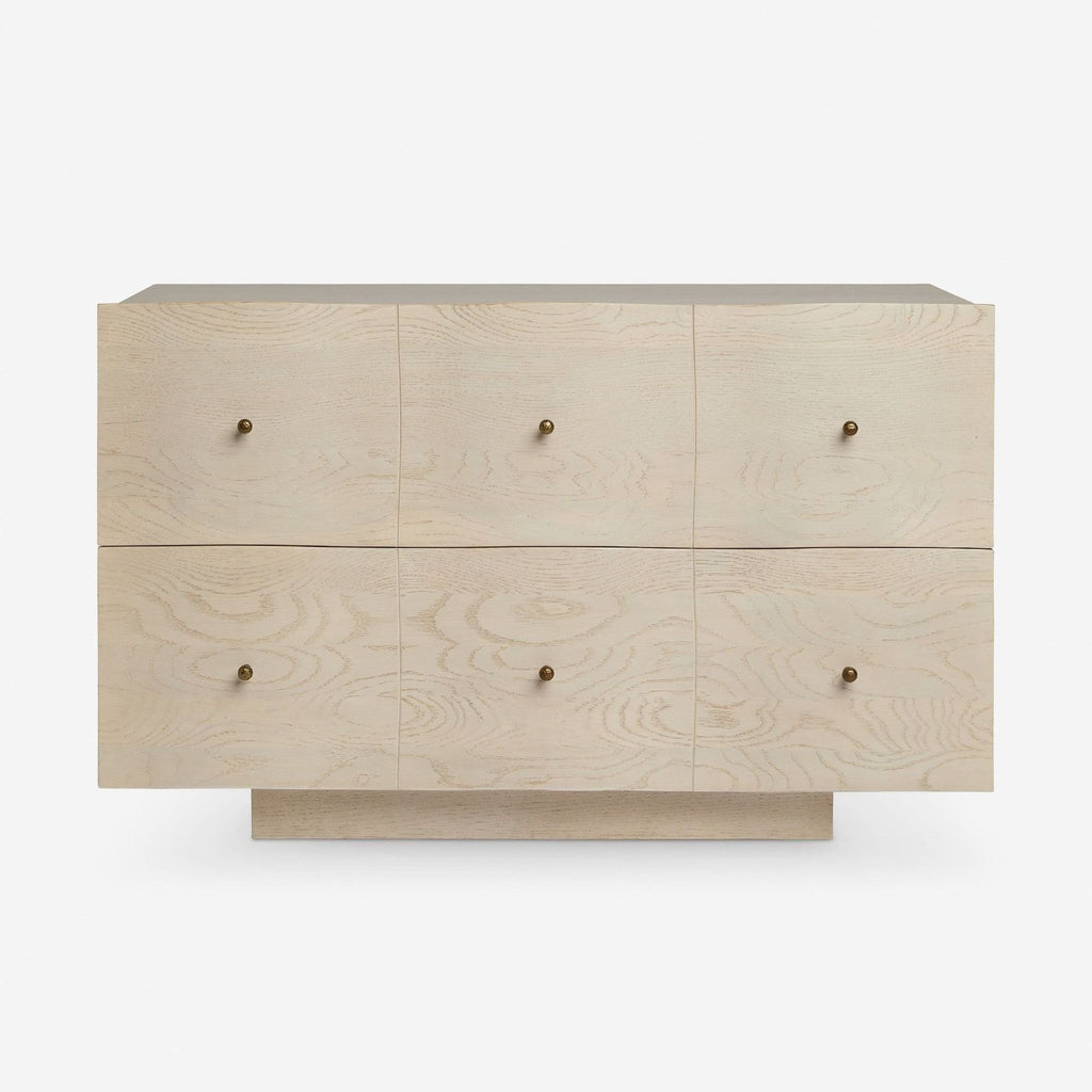 Light wood end table by Lulu and Georgia with six small brass knobs, modern minimalist style.  