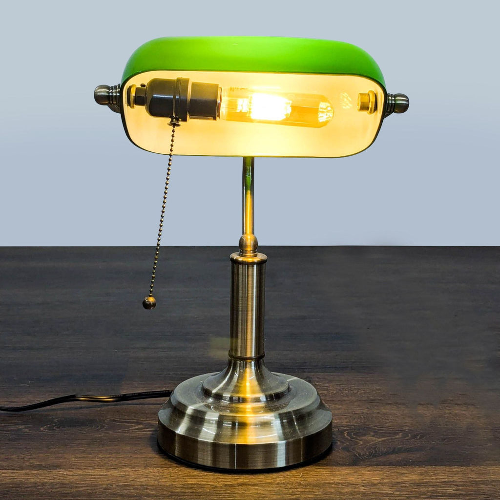 Classic brass and green bankers lamp by TorchStar, featuring a pull chain switch for easy lighting control.  