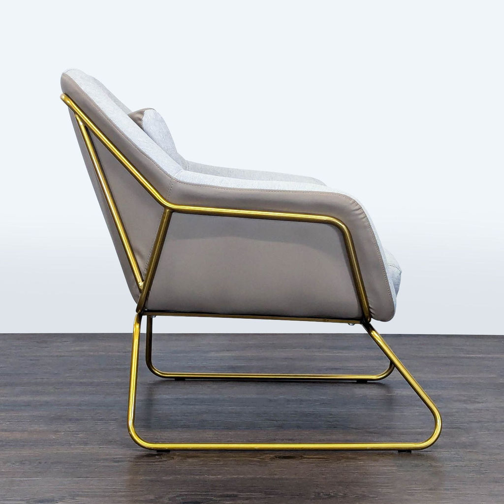 2. Side view of a modern Reperch lounge chair showing angled gold frame and plush neutral upholstery.