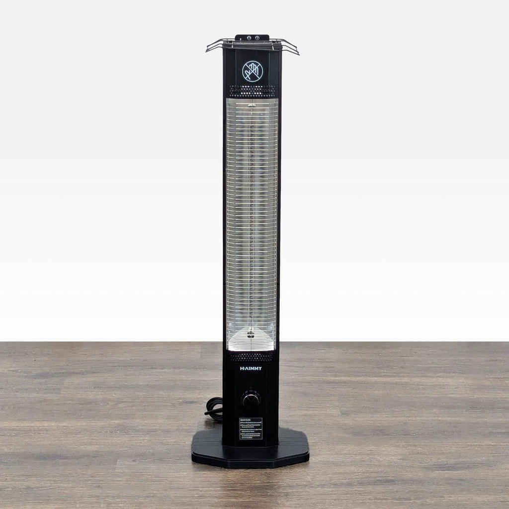 1. Front view of the slim Haimmy electric tower heater with control knob and stable base, ideal for room heating.