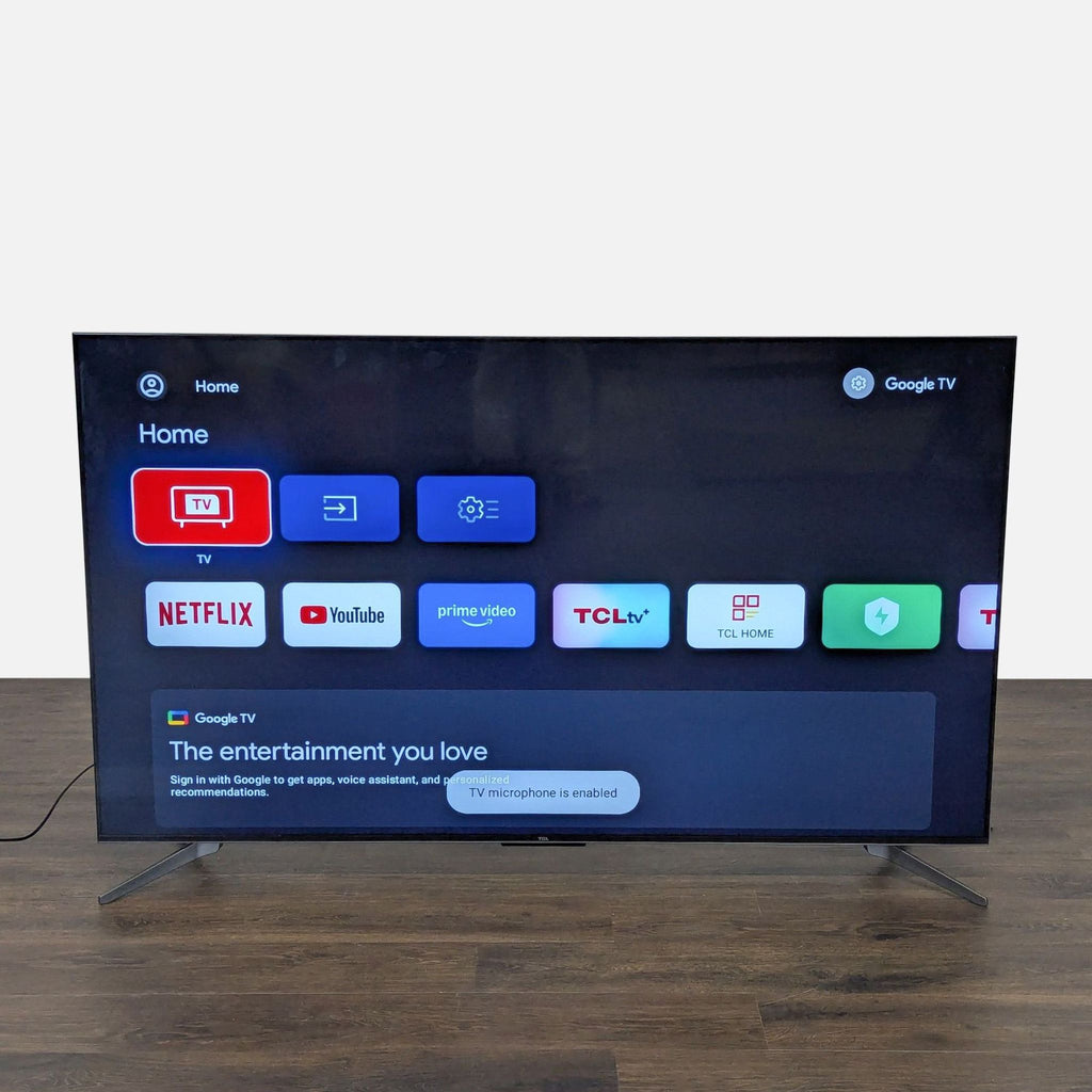 2. TCL 65" Smart TV displaying Google TV interface, showing popular apps like Netflix, YouTube, and Prime Video.