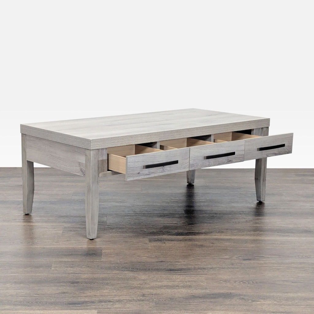 2. Angled view of a Hooker Furnishings coffee table showing open drawers for storage functionality.