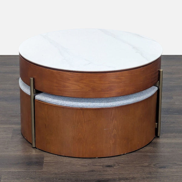 Brayden Studio coffee table with brushed gold stainless steel legs and a glossy natural stone slab tabletop.