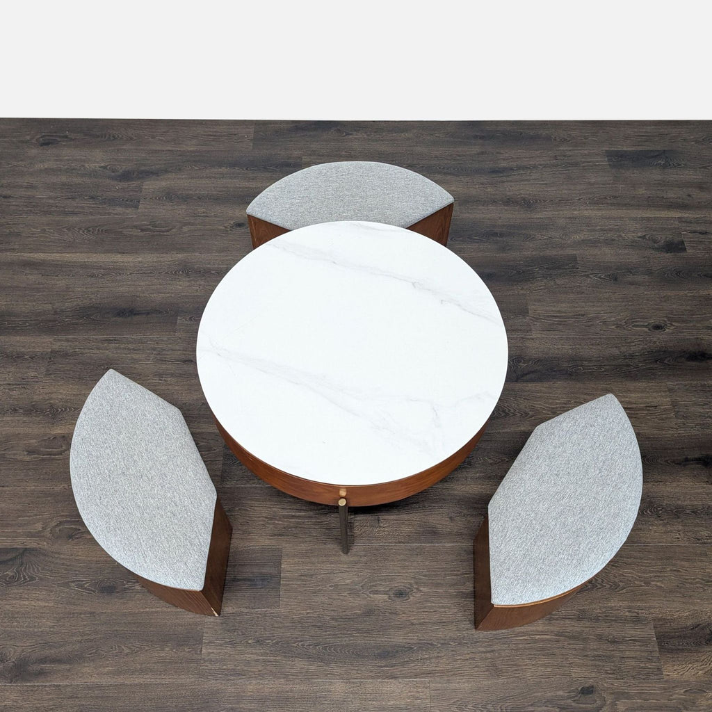 2. Top view of Reperch coffee table showing a circular white surface and two matching semicircular cushioned benches.