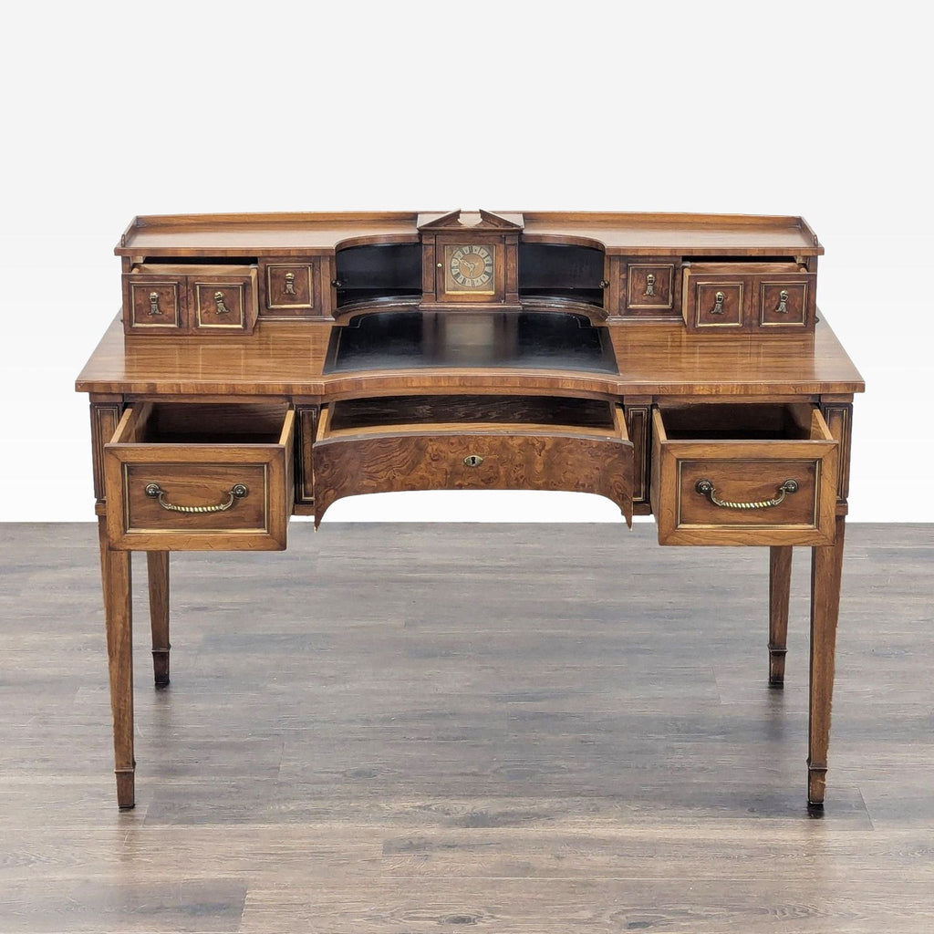 2. Reperch desk in wood finish shown with open drawers, revealing spacious storage and practical design elements.  