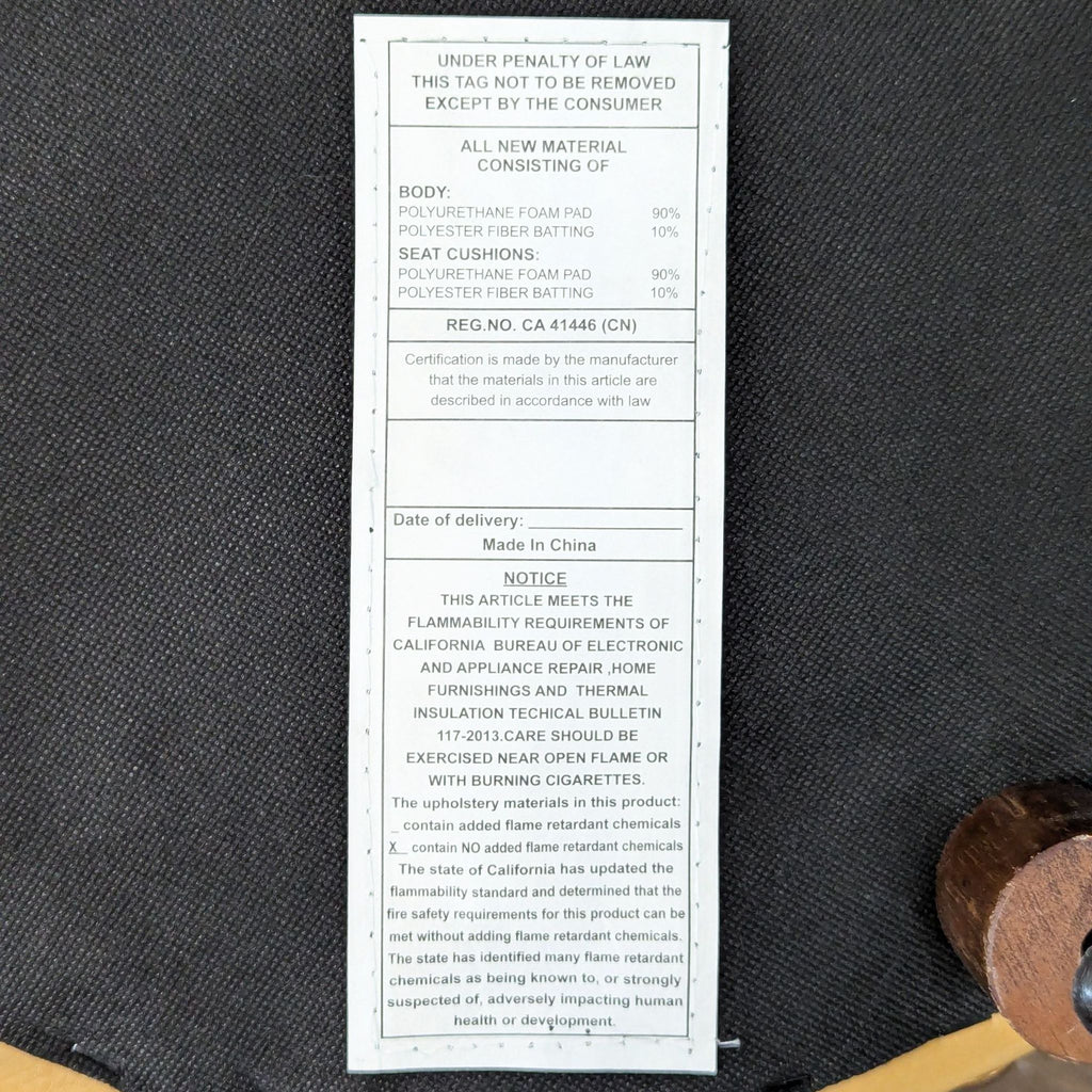 Upholstered Ottoman with Nailhead Trim