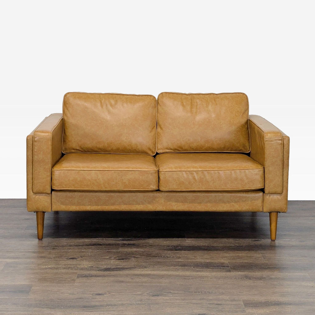 1. Albany Park tan vegan leather loveseat with mid-century modern design, clean lines, and tapered wooden legs, front view.