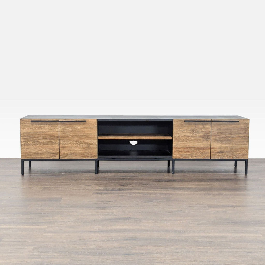 1. Crate & Barrel entertainment center with solid teak doors, shelves, and black steel tube base, front view.