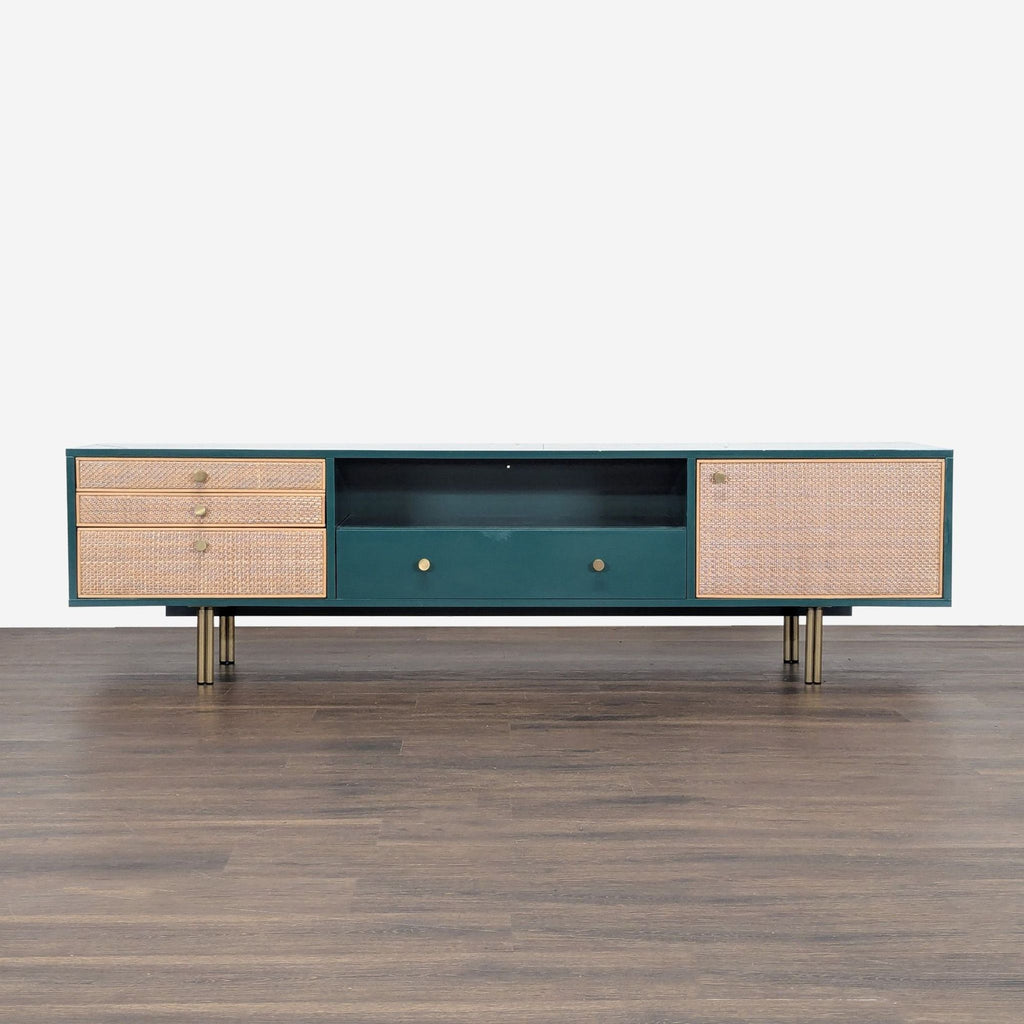 1. Mid-century style Anthropologie entertainment center with rattan drawers, brass legs, and bold veneer front.