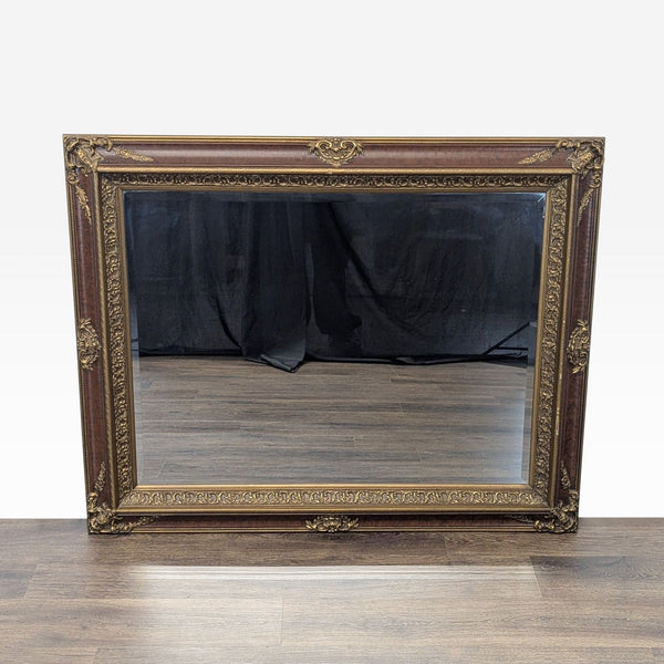 1. Ornate rectangular Reperch mirror with detailed gold trim and a classic wood frame, reflecting a wood floor.  