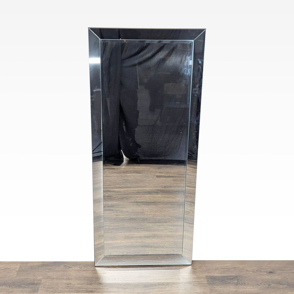1. Tall rectangular mirror with a beveled silvered frame from Coaster, displayed standing on a wood floor.