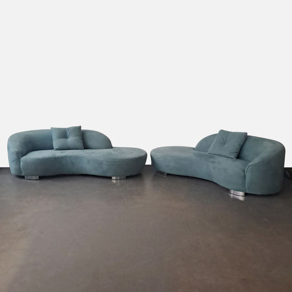 1. Curved sectional sofa by Lazar Industries with soft upholstery, matching pillow, and silver legs for modern decor.  