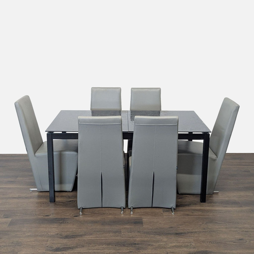 2. Reperch dining set with six gray chairs and a black rectangular table on a wooden floor.