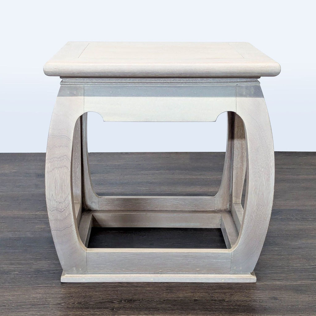 1. Reperch end table with a square top, curved wooden legs, and light wood finish, on dark flooring.