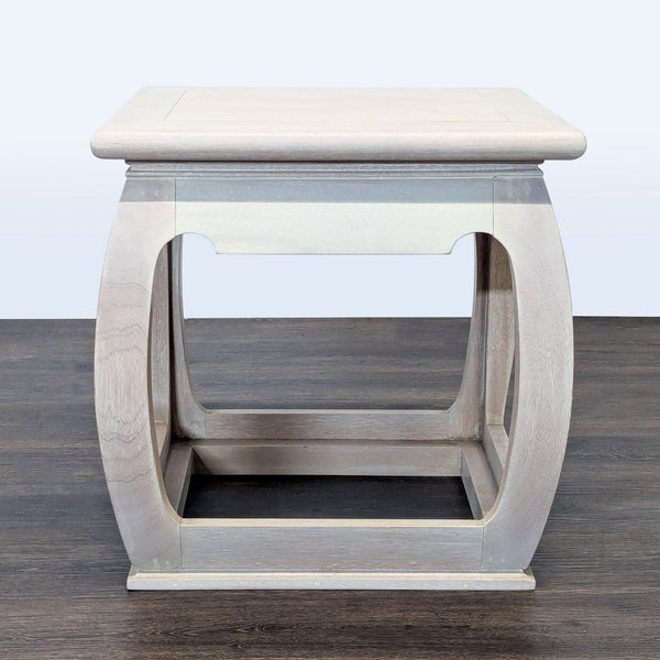 1. Reperch end table with a square top, curved wooden legs, and light wood finish, on dark flooring.