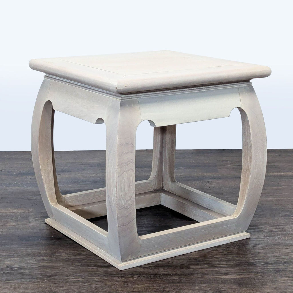 2. Modern Reperch end table in light wood, featuring open sides and elegant rounded leg design.